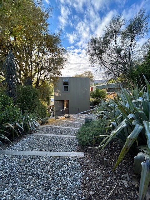 both homes (Pod in foreground, Hut in background)