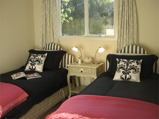 Bedroom 4 w two single beds