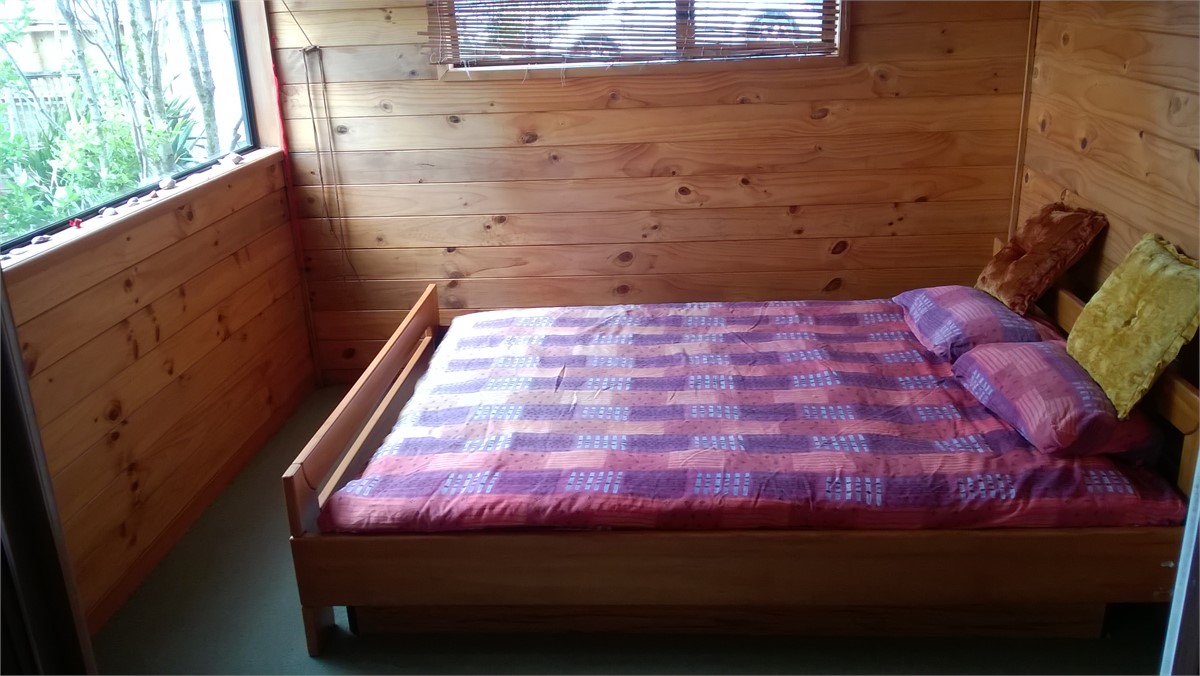 queensize bed with sea views