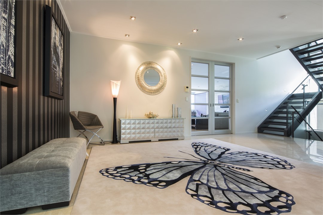 a stylish entrance via internal lift