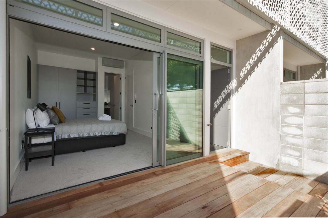 Downstairs master bedroom w/ balcony