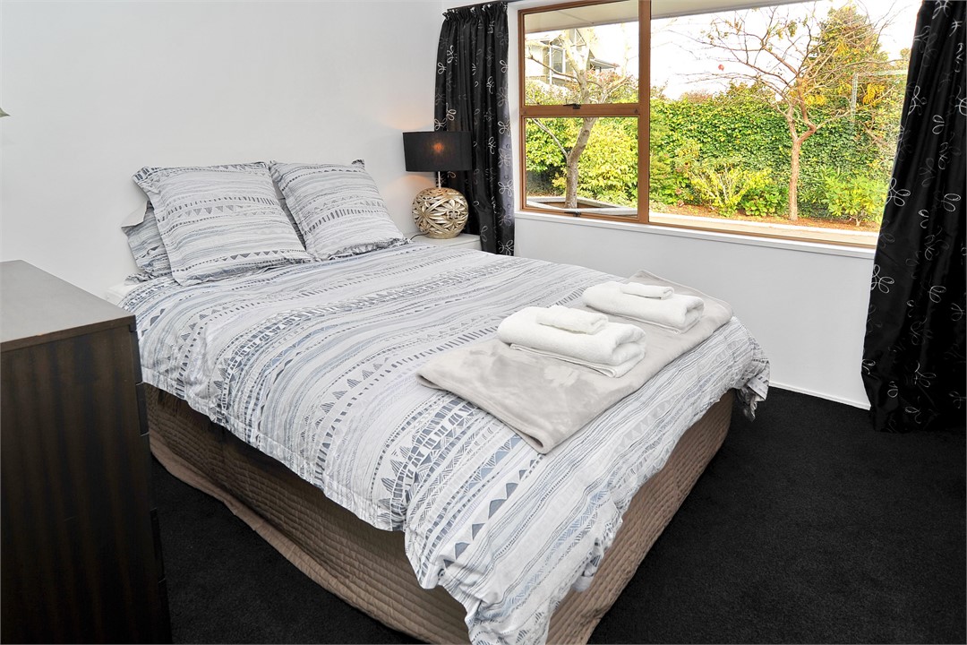 Bedroom 2 has a Queen bed