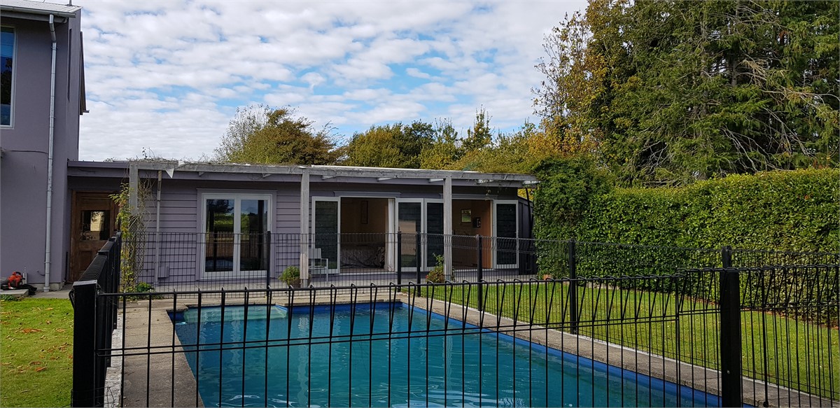View over pool to Homestay