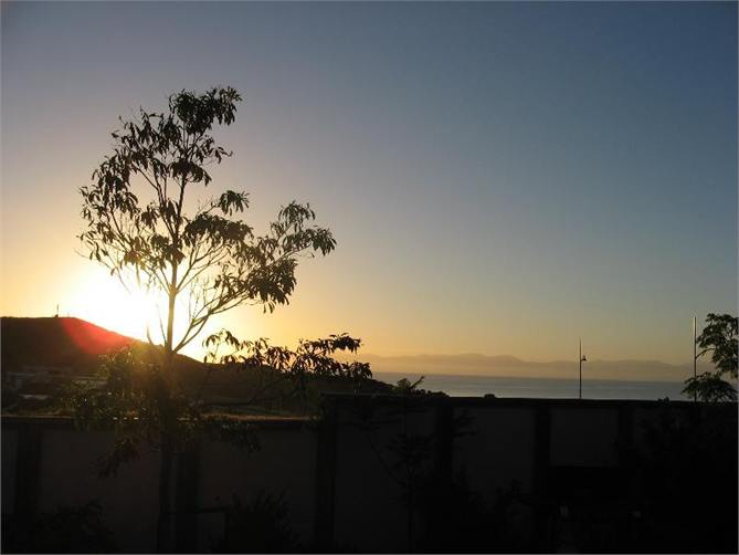 the rear of the house looks over the bay towards N