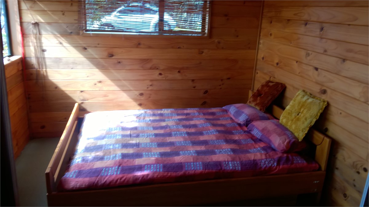 queensize bed with sea views