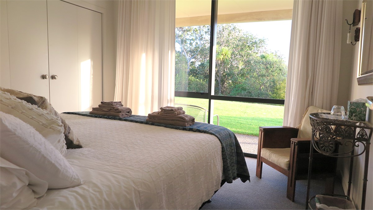 Bedroom 1, slider door to garden