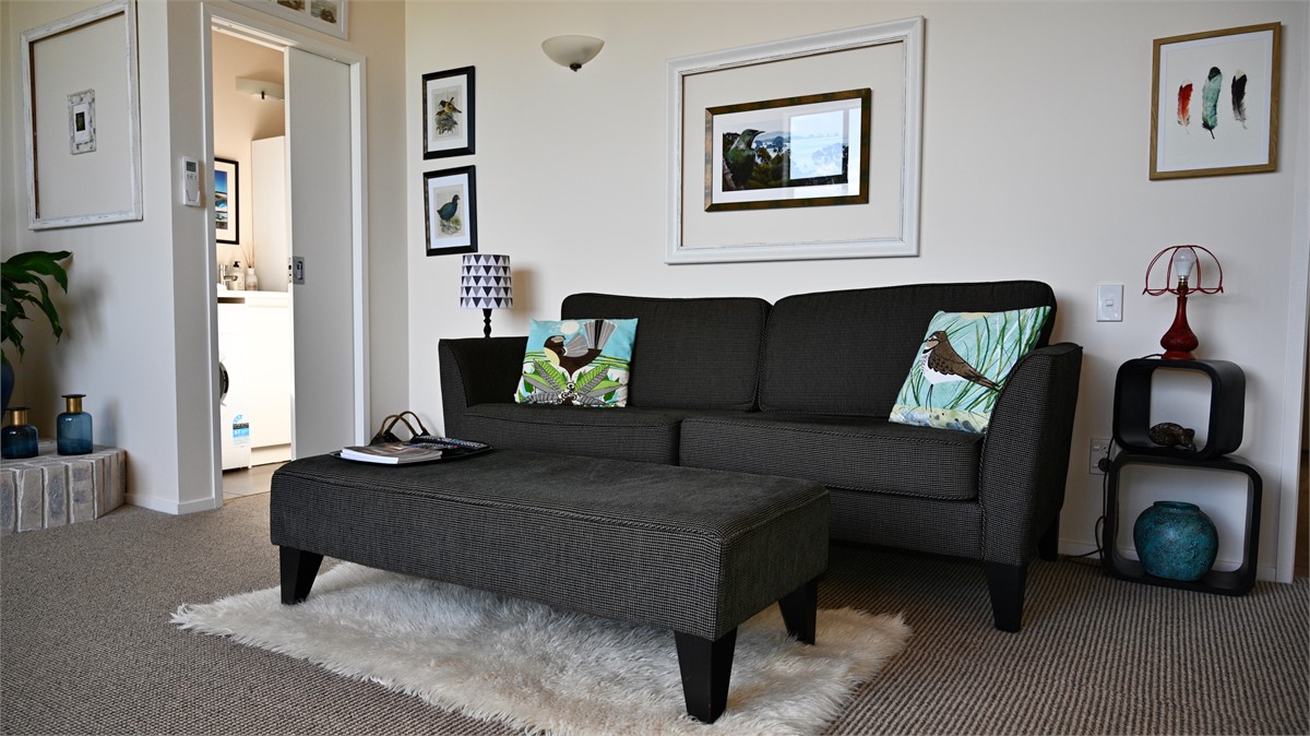 Living room showing through to laundry room with w