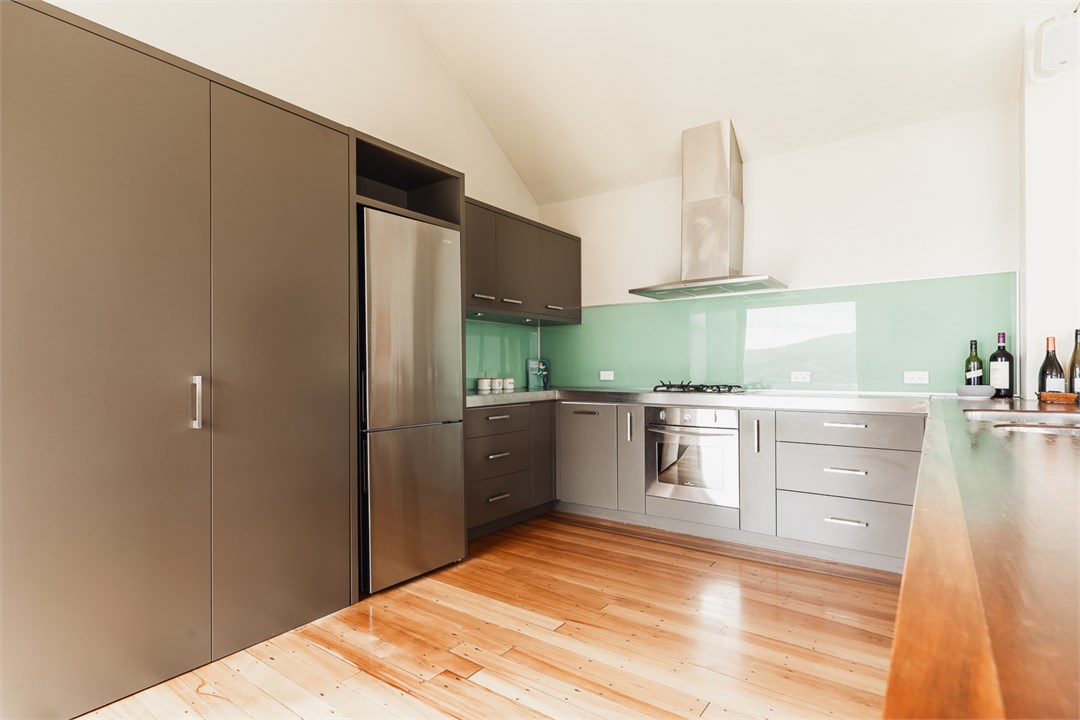 Kitchen with fridge, oven, stove, dishwasher