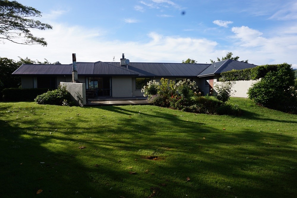 View towards front of house and patio
