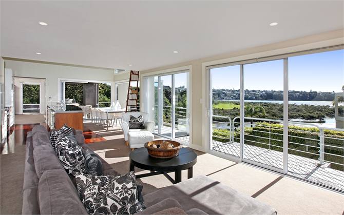 Family room adjacent to kitchen dining.