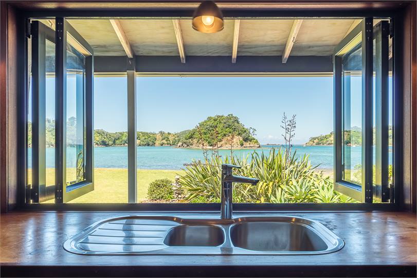 Kitchen bi-folds open to serve to the verandah or 