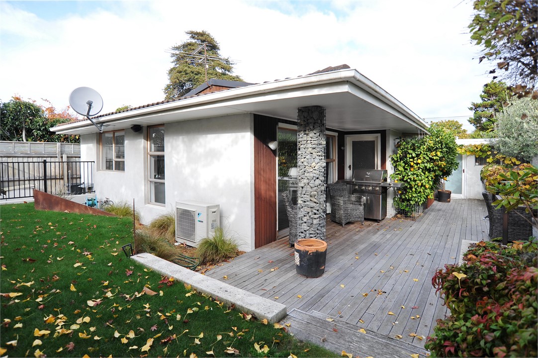 Outdoor courtyard and view of the property buildin