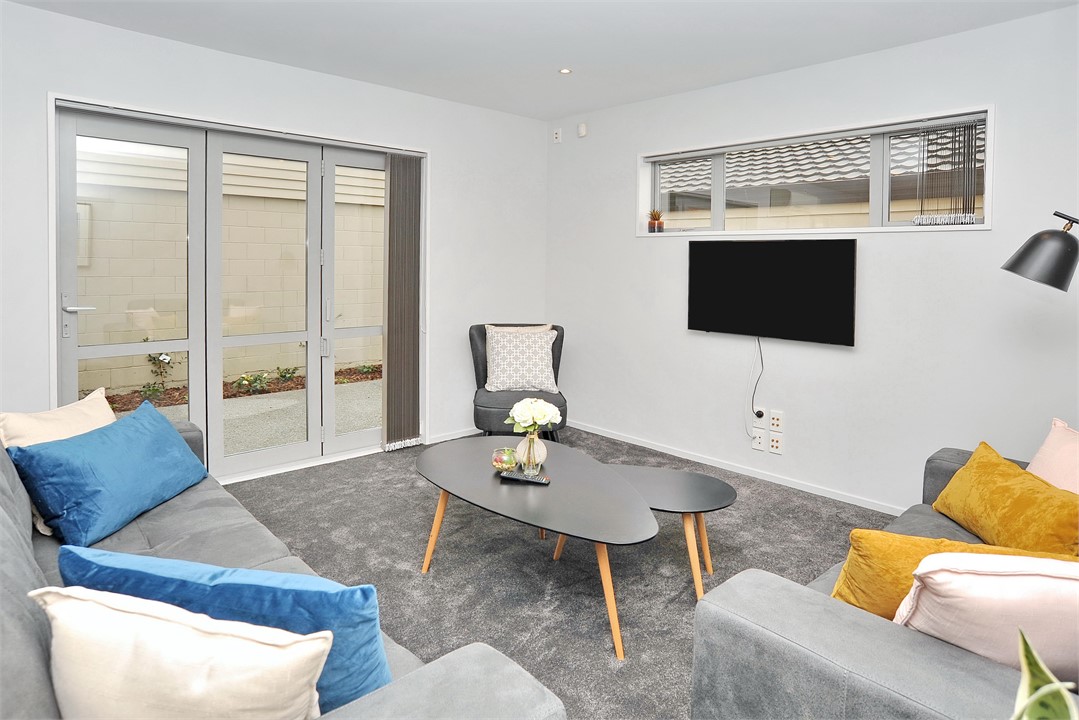 Living area has a TV and seating areas