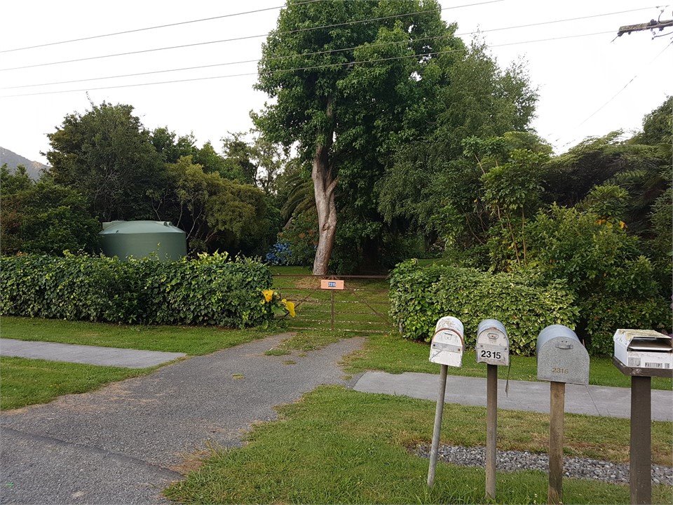 Driveway entrance from QC Drive