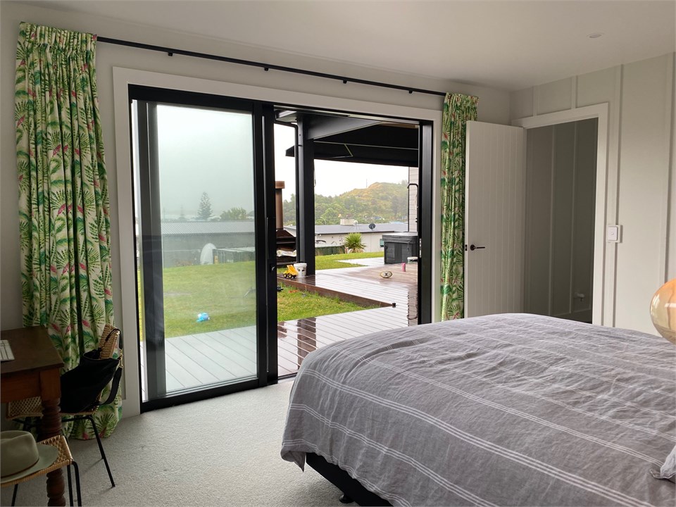 Master with Sliding Door opening to Deck