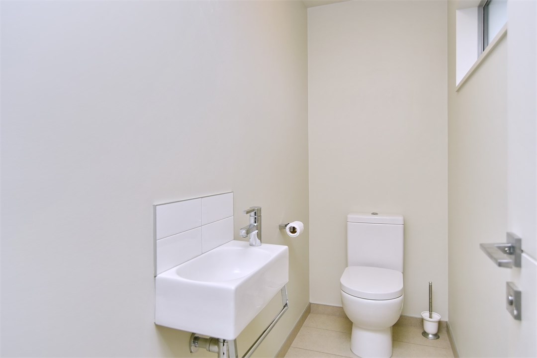 Bathroom 3 has a shower and a toilet