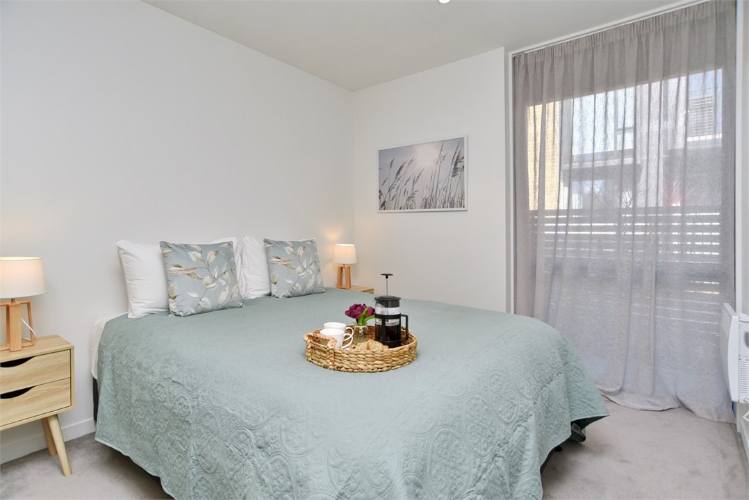 Bedroom 1 has a Queen bed