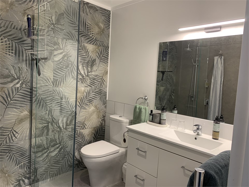 Bathroom - double head shower. Spacious vanity.  H