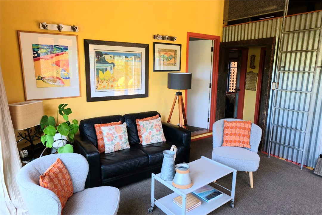 Lounge, ladder to mezz. low ceiling bedroom