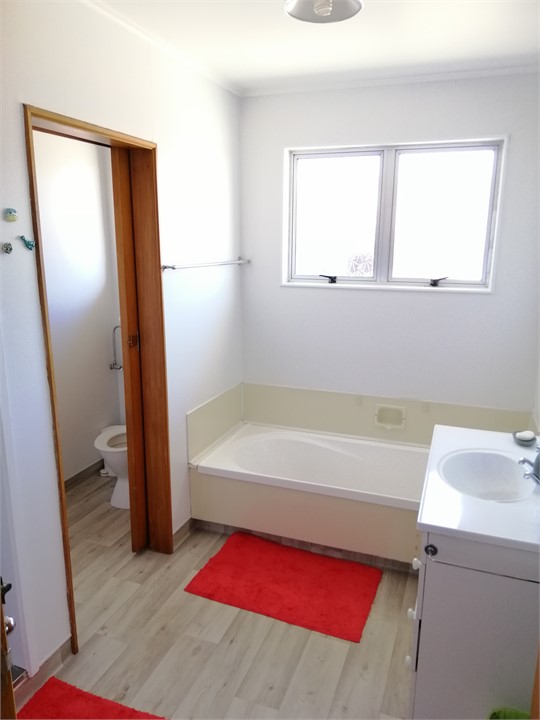 Bathroom with shower and bath; separate toilet