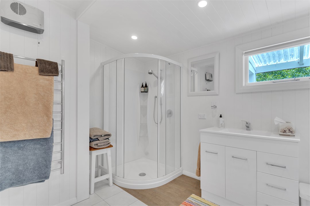 Full bathroom, unlimited hot water, heated floor.