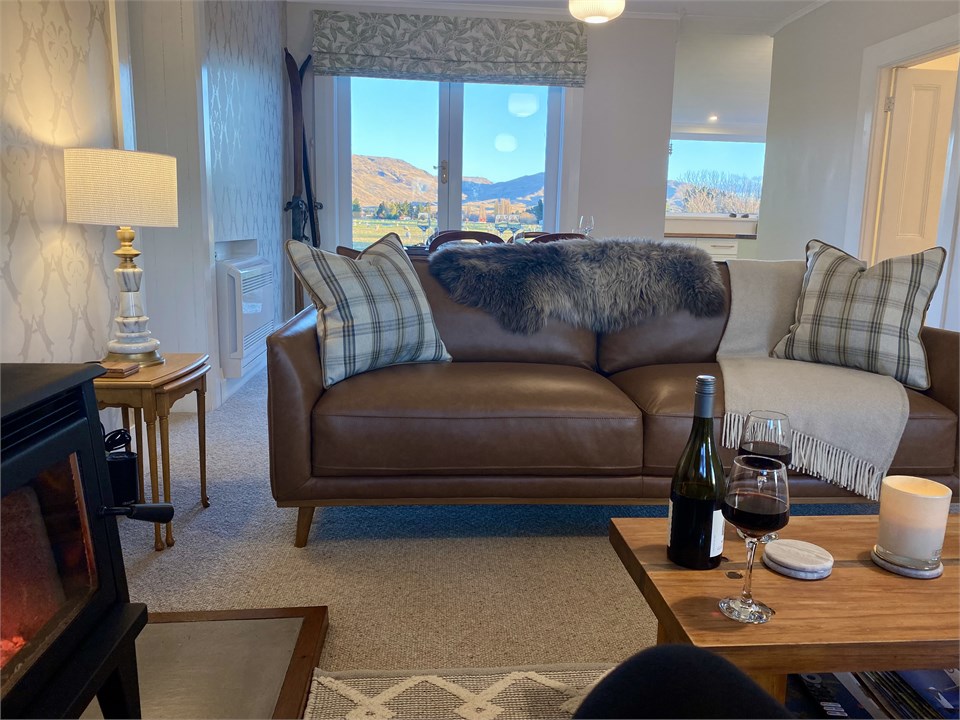 Enjoy the views while relaxing by the fire.