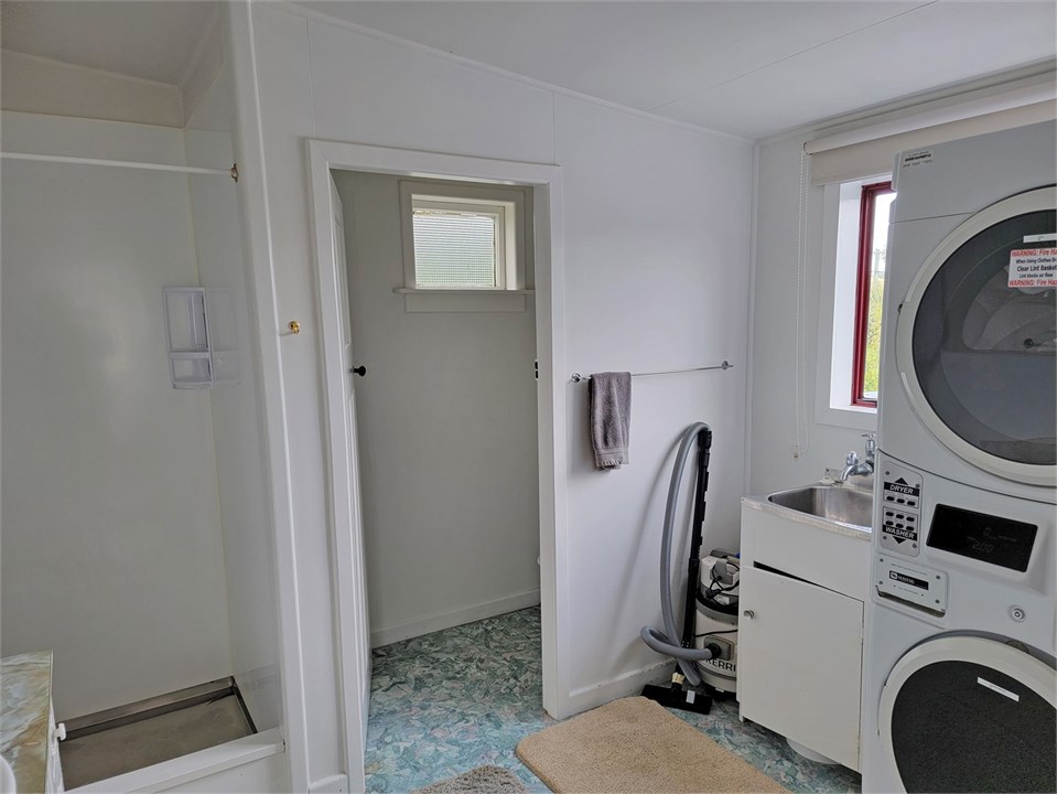 $2 coin operated Washing Machine/Dryer.