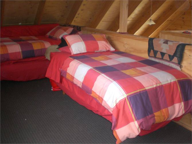 Family area singlebeds upstairs