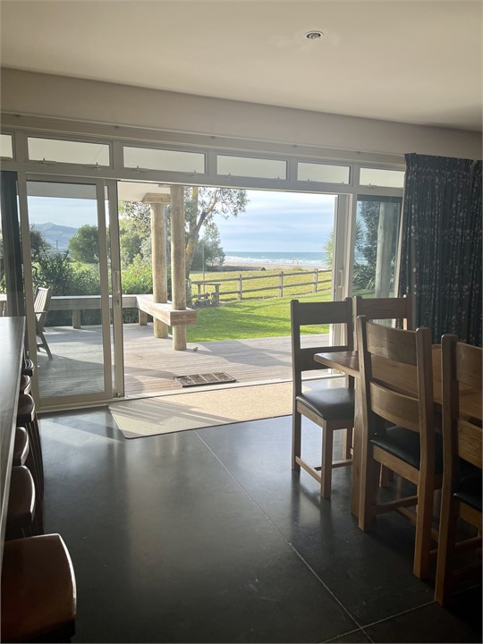 Sit at the kitchen table and listen to the surf cr