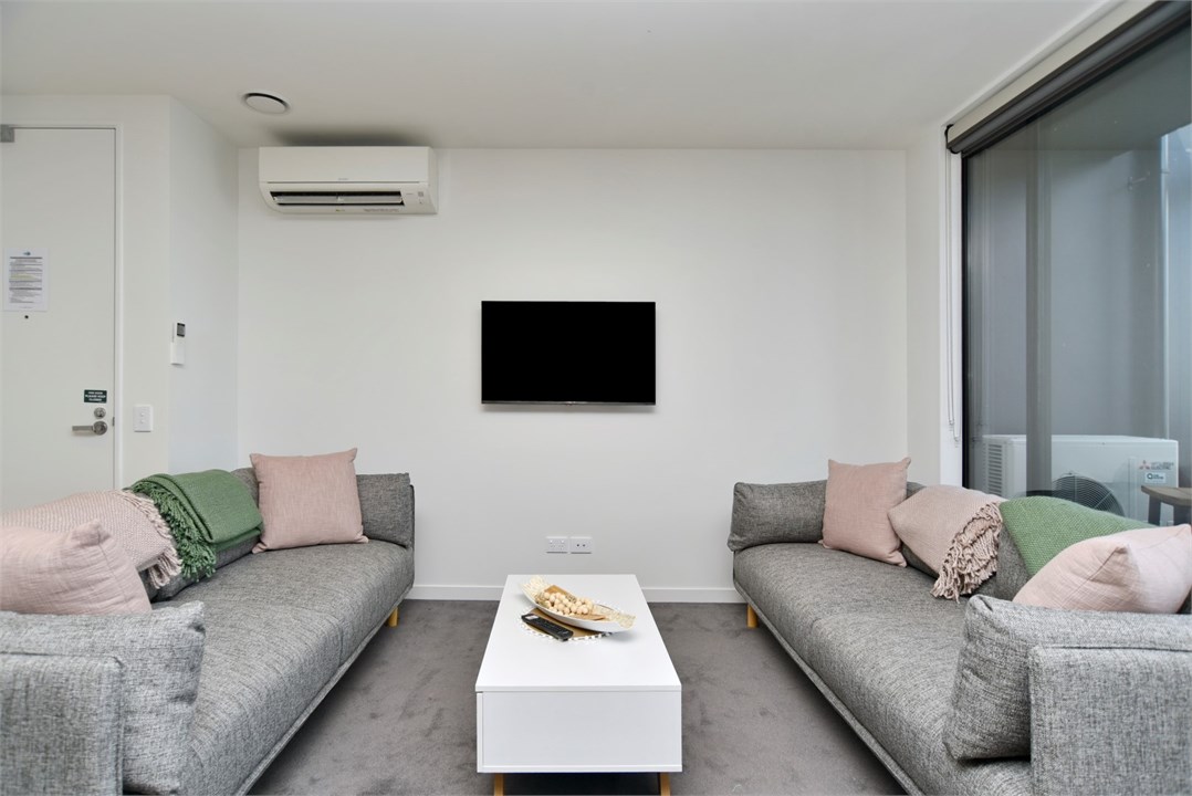Living area with a TV and seating areas