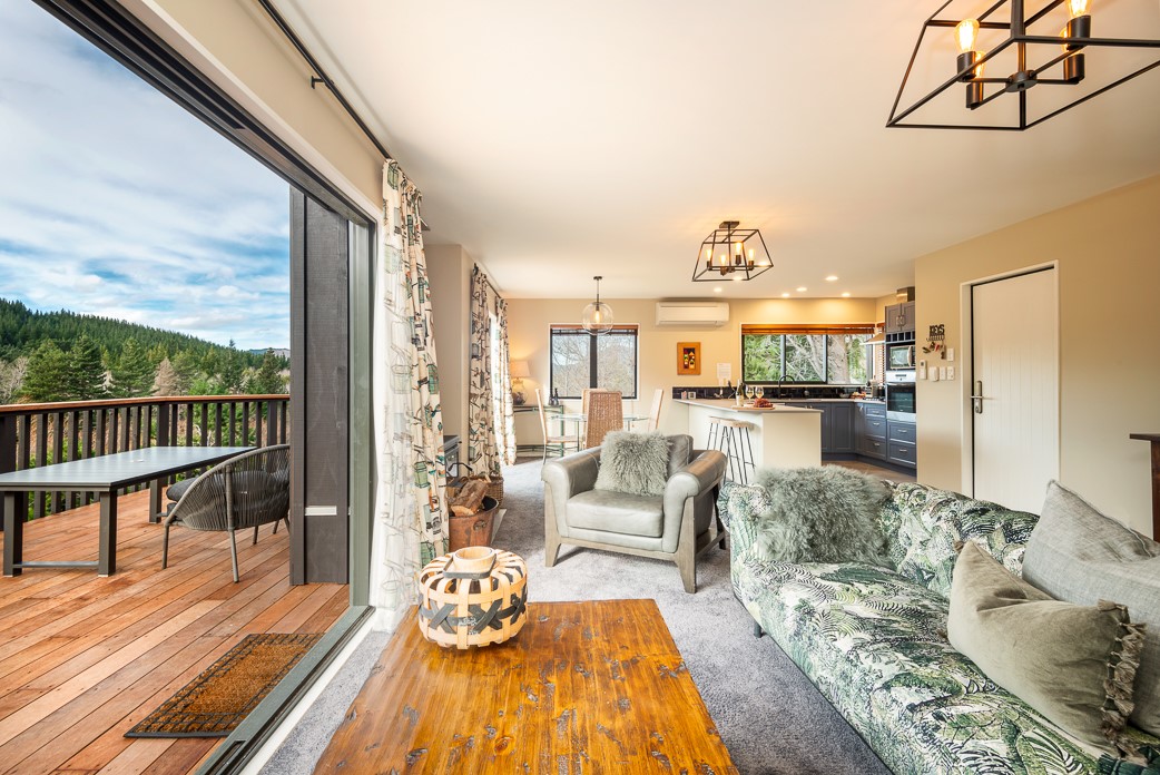 Full mountain views from deck with living opening 