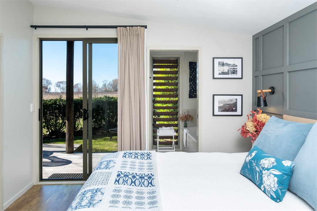 bed through to bath and outdoors