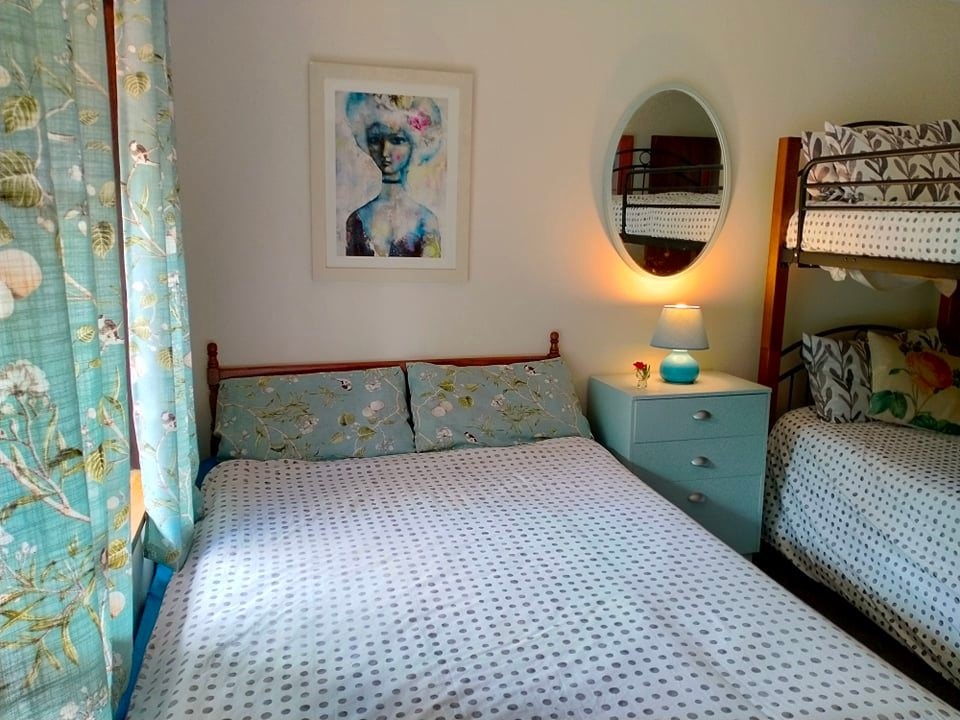 Bunk room with queen bed