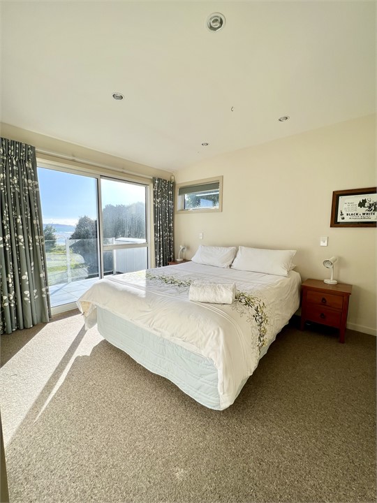 Upstairs bedroom 2.  Lovely comfortable queen bed.