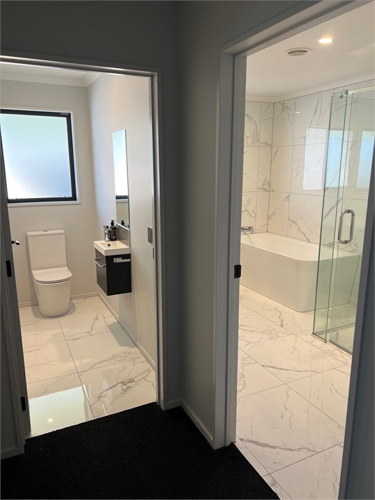 Entrance to toilet and main bathroom