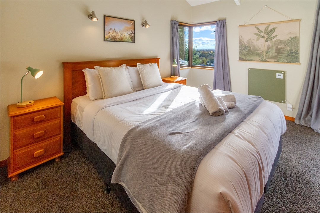 Master bedroom with King-size bed, stunning views 