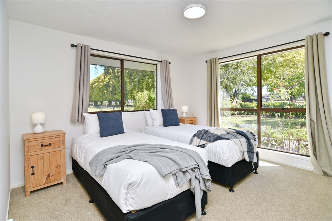 Bedroom 1 shown split into 2 Single beds