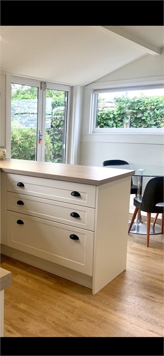 Kitchen/ dining with French doors onto deck and re