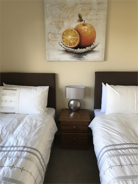 The 3rd bedroom has twin king single beds