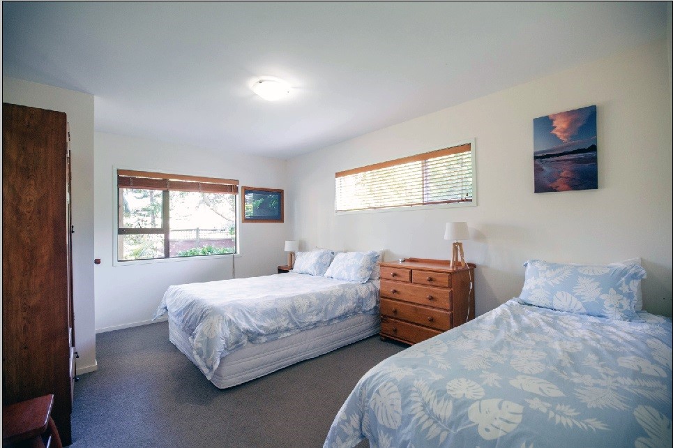 Downstairs bedroom - 1 queen and 1 single bed