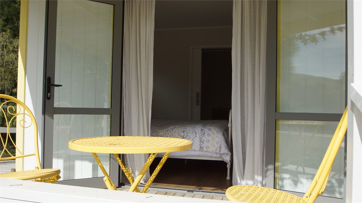 Second bedroom from generous decks and morning sun