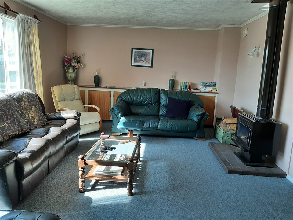 lounge, log fire, TV. views of the Kirkliston Hill