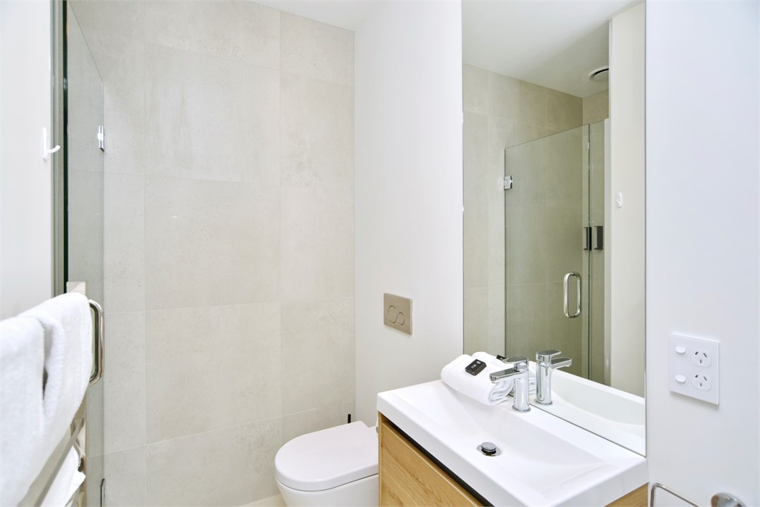 Bathroom 1 has a shower and a toilet