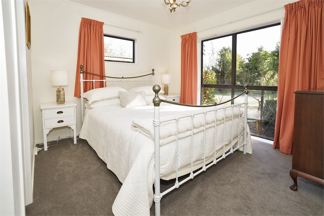 Bedroom 3 has a Queen bed