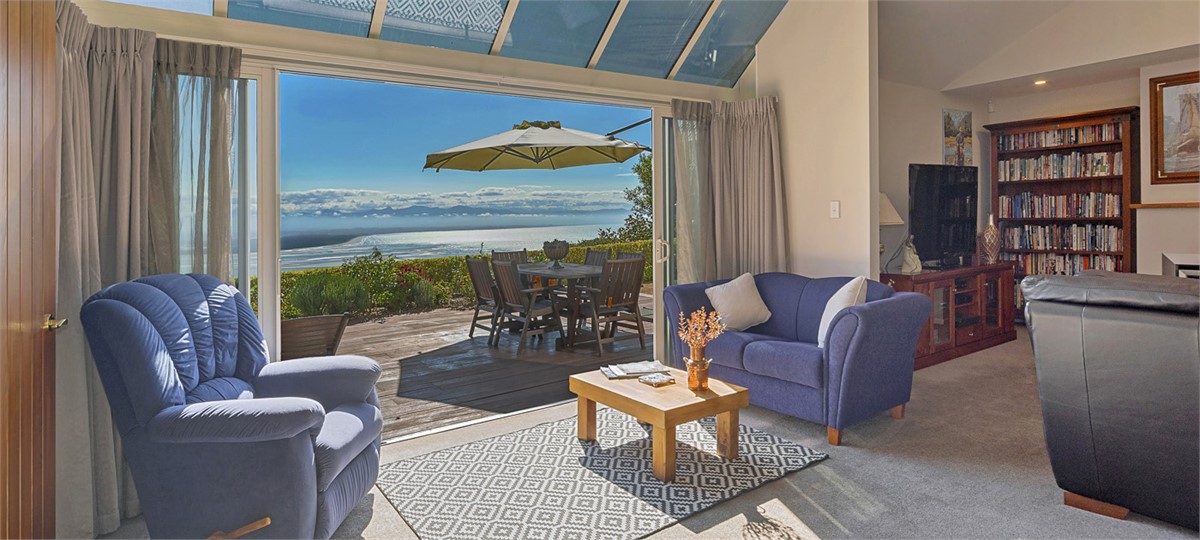 Sunroom opening on outdoor Dining