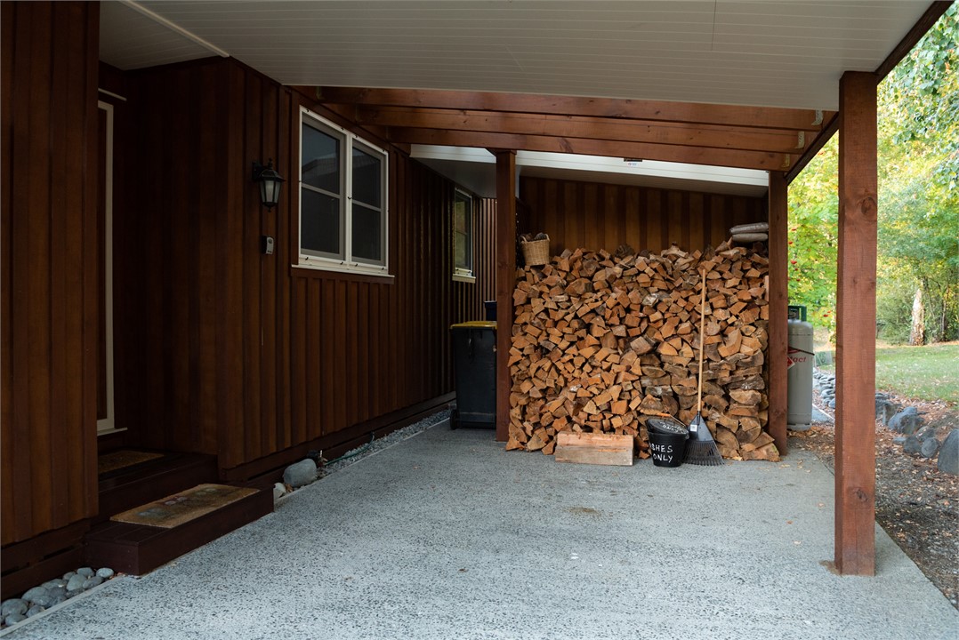 Carport and woodstack