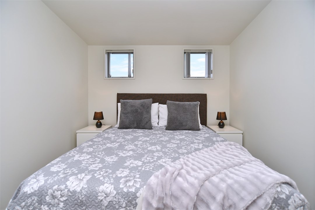 Bedroom 4 has a Queen bed