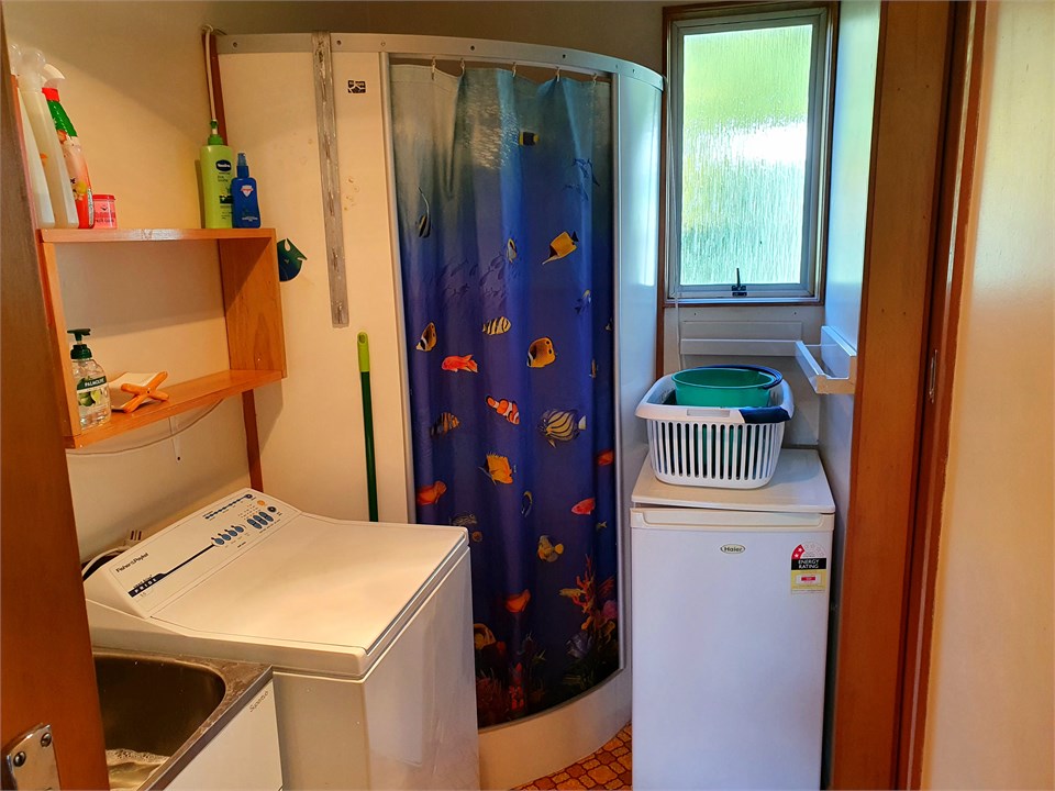 Bathroom/Laundry with toilet (and MAINS switch)