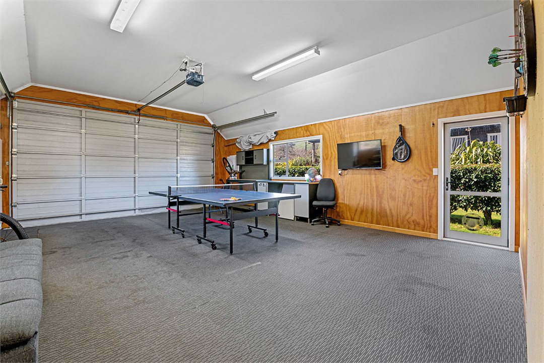 Garage converted into games room with table tennis
