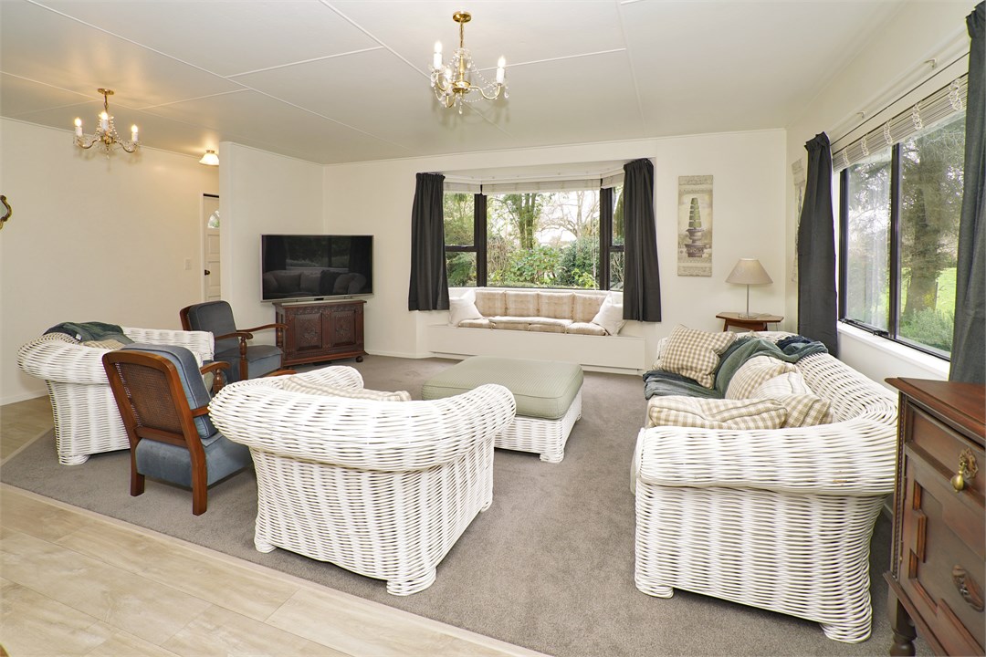 Living area has a TV and seating areas